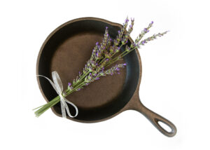 cast iron skillet with bundle of fresh lavender