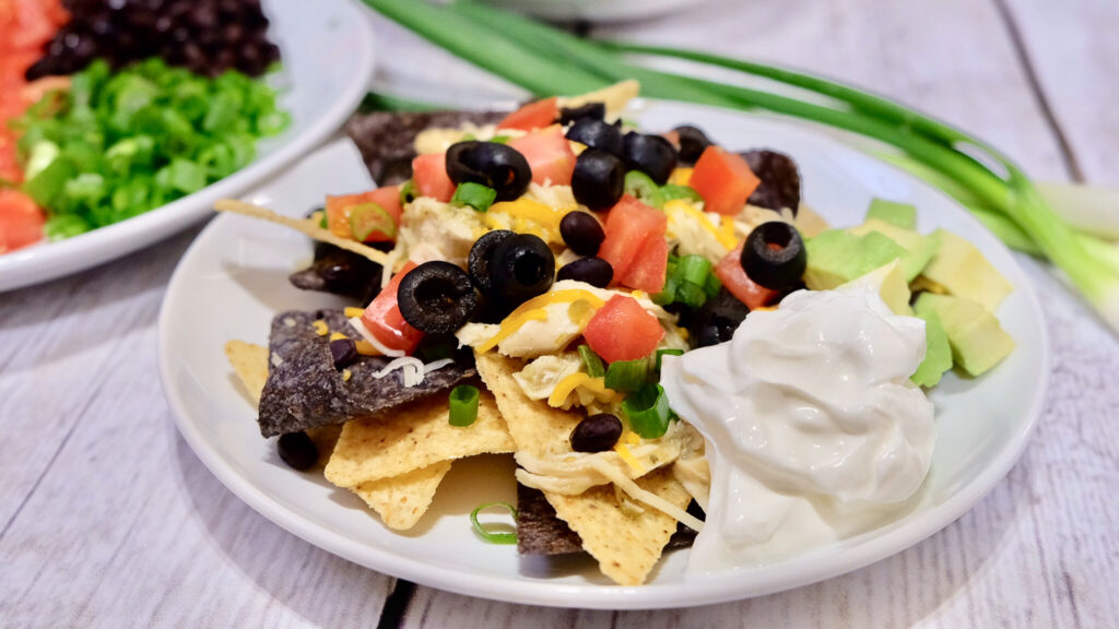 nachos on a white plate