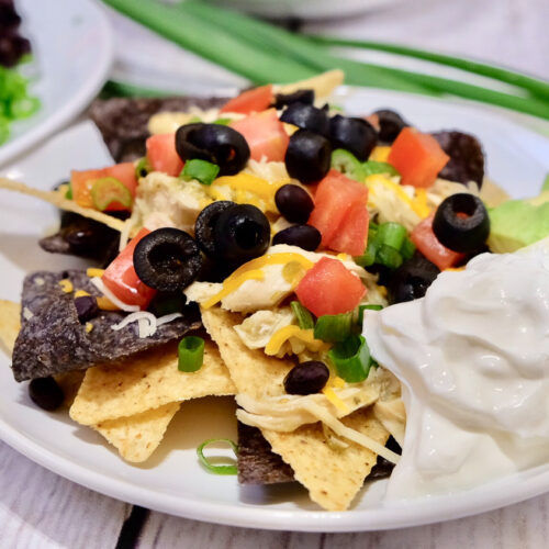 nachos on a white plate