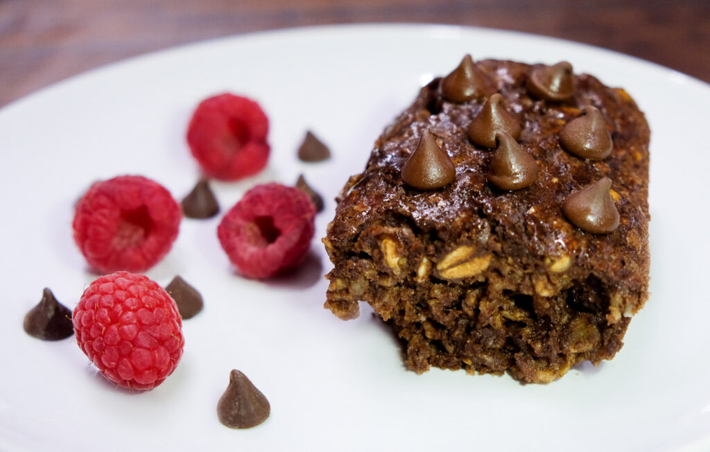 chocolate peanut butter baked oatmeal with raspberries