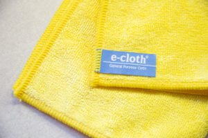 close up of yellow ecloth with label