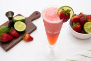 frozen strawberry margarita in a tall glass