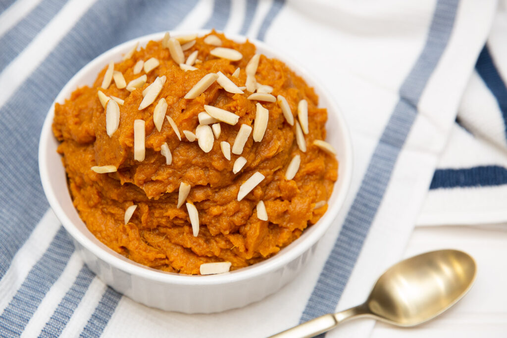 mashed sweet potatoes in a white bowl