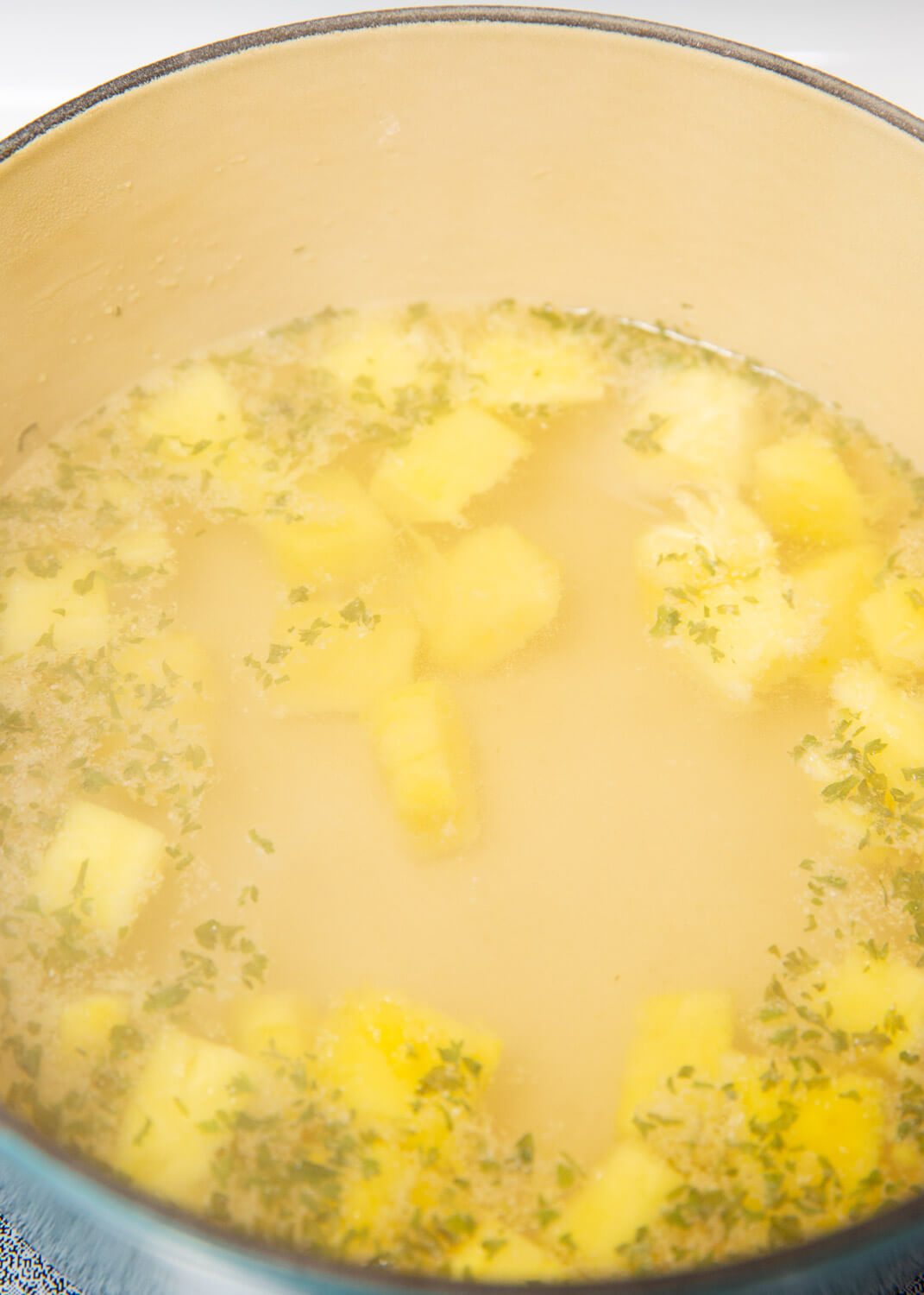 pineapple and spices in boiling water